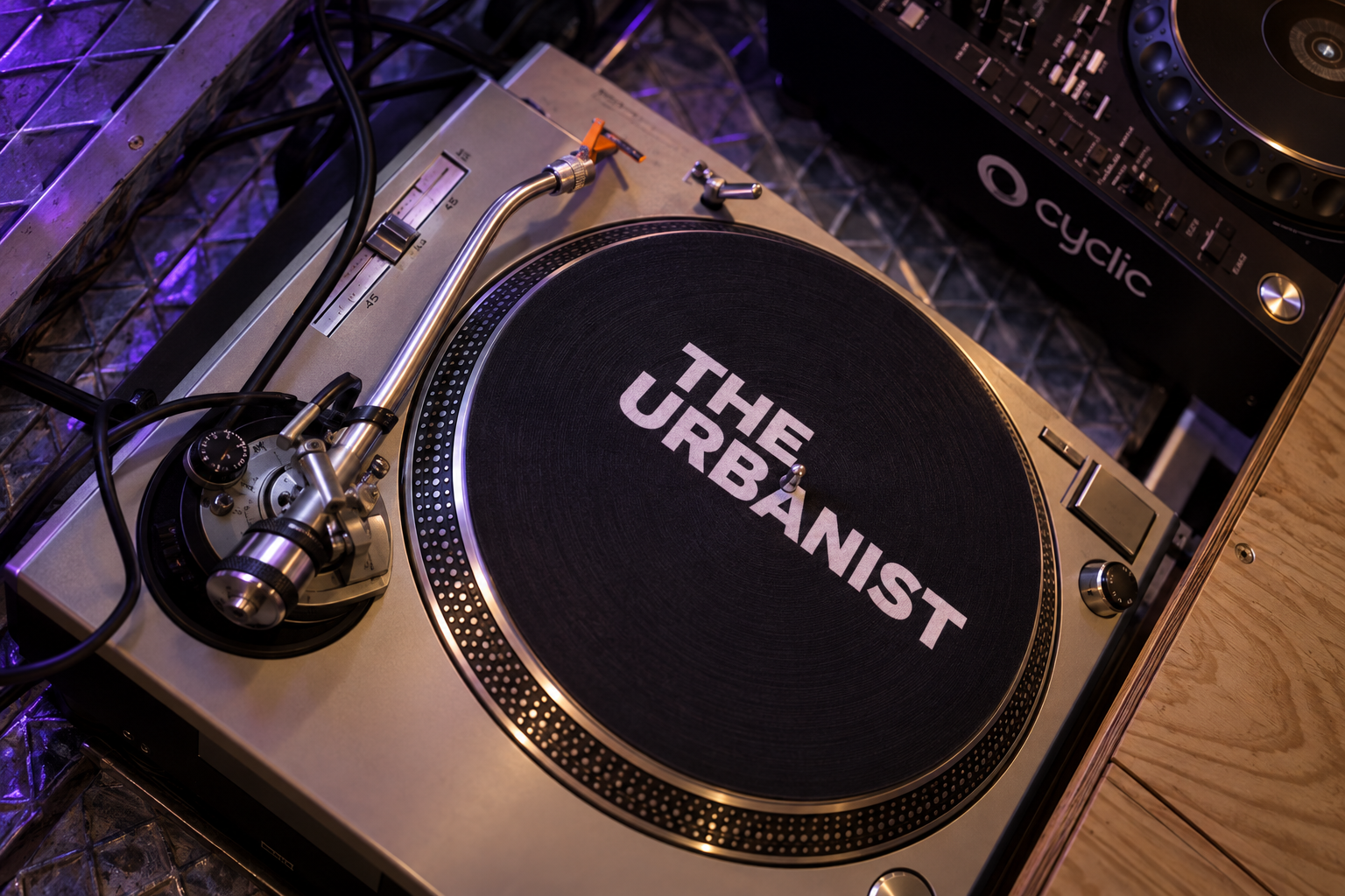 Silver turntable with The Urbanist slipmat